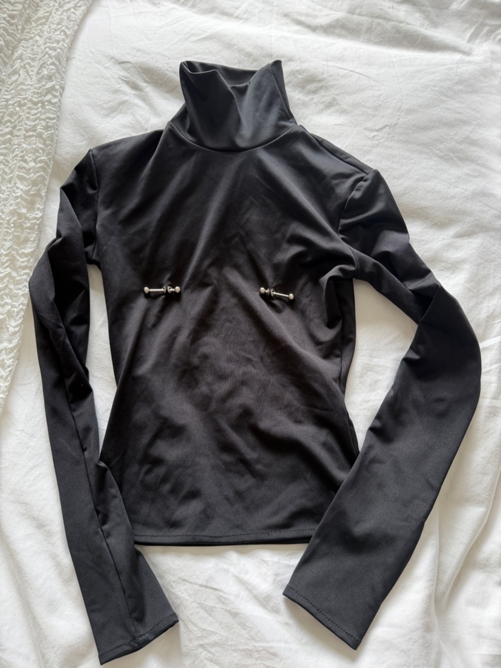 Black Long-Sleeve Turtleneck Top with Decorative Hardware